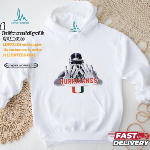 Football player garb Miami Hurricanes logo shirt