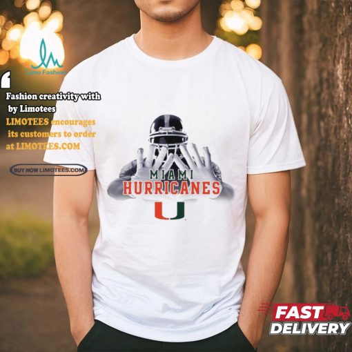 Football player garb Miami Hurricanes logo shirt