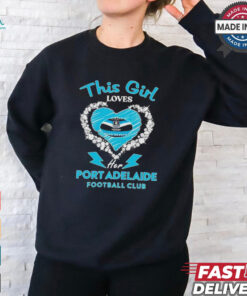 This girl loves her Port Adelaide football club heart shirt