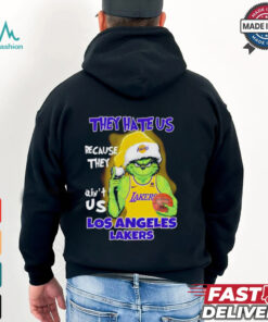 Grinch Santa hat middle finger they hate us because they ain’t us Los Angeles Lakers shirt