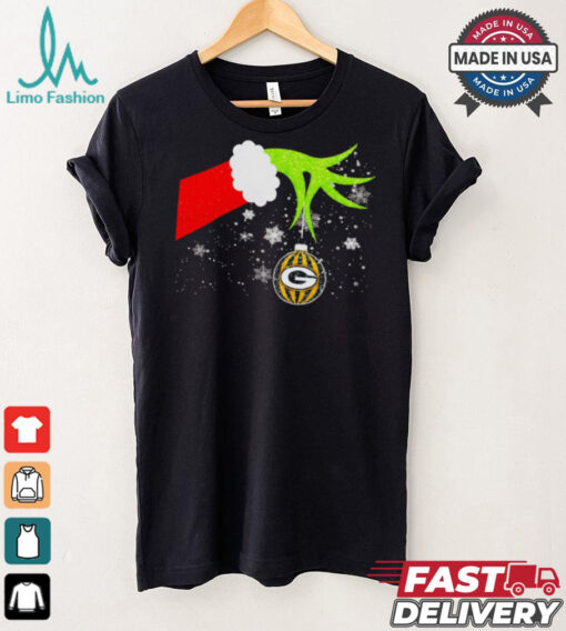 Grinch hand holding ornament Packers football Christmas shirt