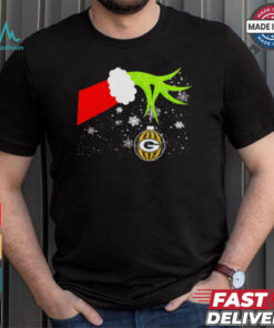 Grinch hand holding ornament Packers football Christmas shirt