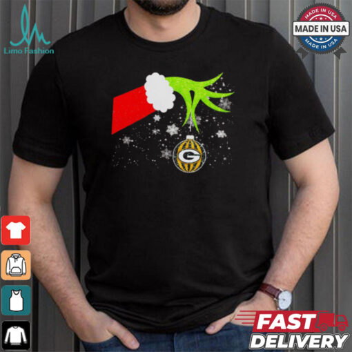 Grinch hand holding ornament Packers football Christmas shirt