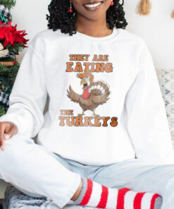 Thanksgiving Trump humor they are eating the turkeys shirt