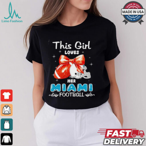 This girl loves her Miami Dolphins Football faux glitter shirt