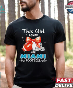 This girl loves her Miami Dolphins Football faux glitter shirt