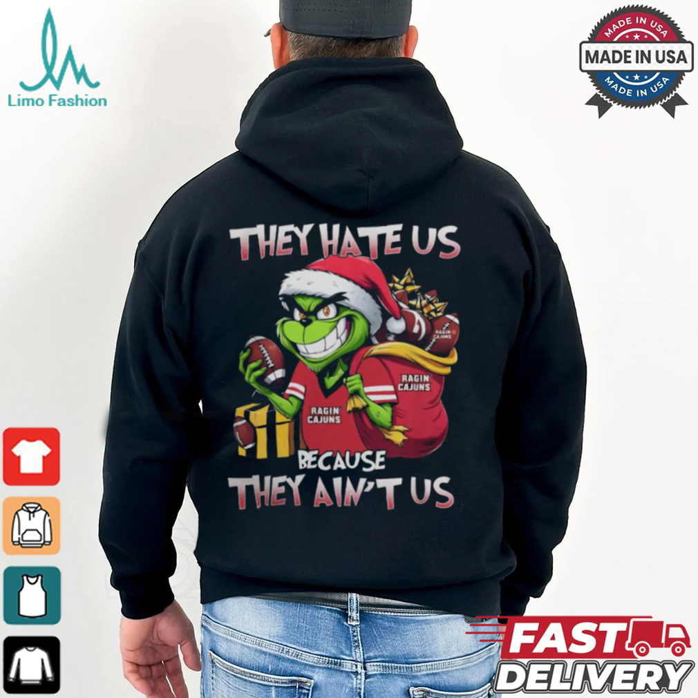 They Hate Us Because They Ain’t Us Grinch X Louisiana Ragin' Cajuns Christmas 2024 Shirt They Hate Us Because They Ain’t Us Grinch X Louisiana Ragin' Cajuns Christmas 2024 Shirt