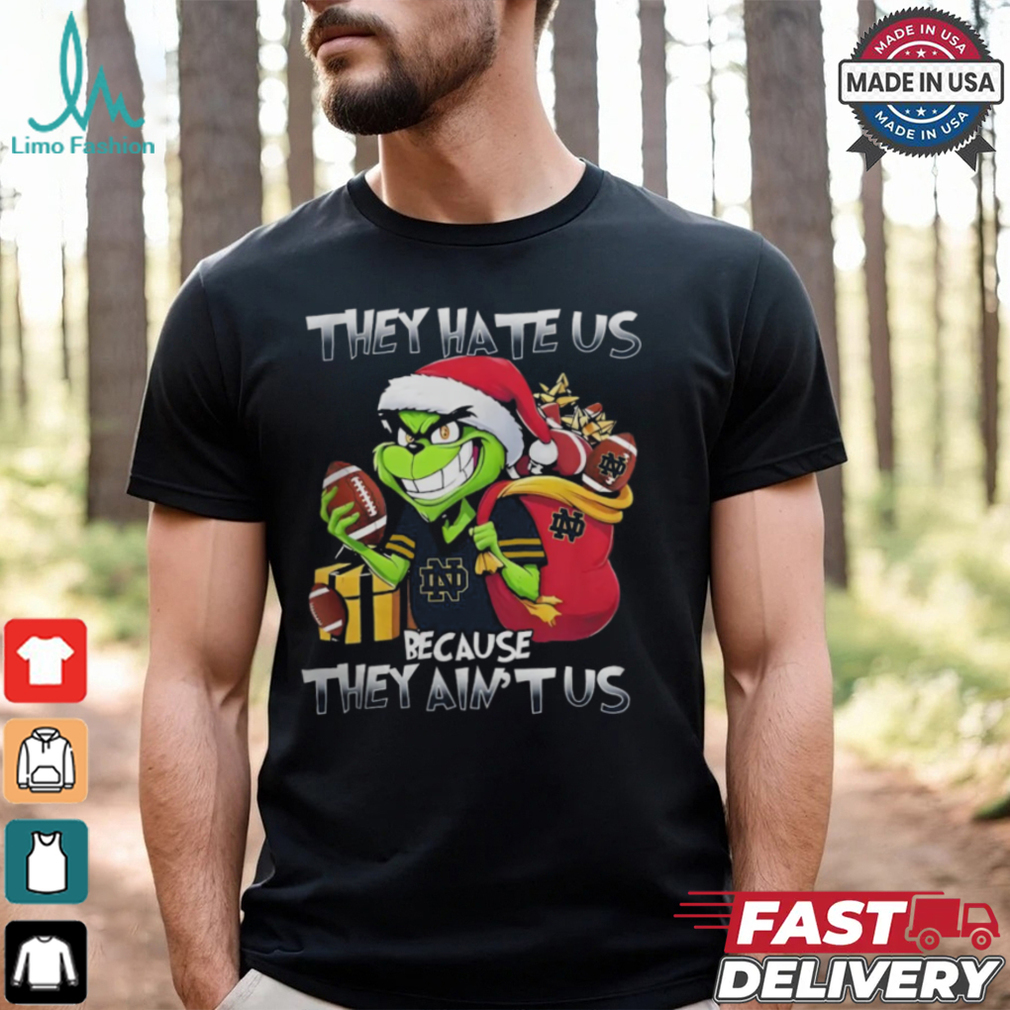 They Hate Us Because They Ain’t Us Grinch X Notre Dame Fighting Irish Christmas 2024 Shirt They Hate Us Because They Ain’t Us Grinch X Notre Dame Fighting Irish Christmas 2024 Shirt