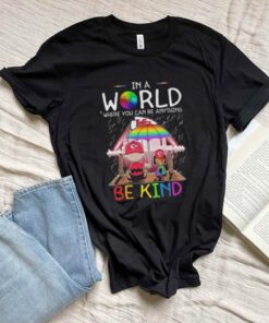 Official Snoopy And Charlie Brown In A World Where You Can Be Anything Kansas City Chiefs E Kind Shirt