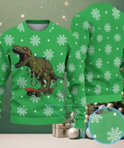 Green Ugly Christmas Sweater with White Snowflake Pattern Featuring Dinosaur with Christmas Lights on Skateboard