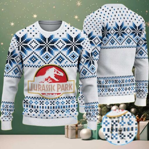 White Ugly Christmas Sweater with Blue Geometric Snowflake Pattern Featuring Jurassic Park Dinosaur Logo