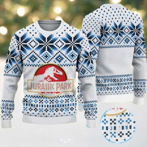 White Ugly Christmas Sweater with Blue Geometric Snowflake Pattern Featuring Jurassic Park Dinosaur Logo